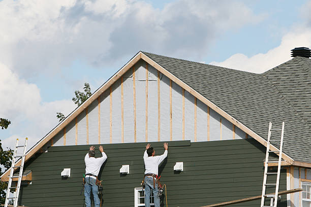 Professional Siding technician working in Toano, VA